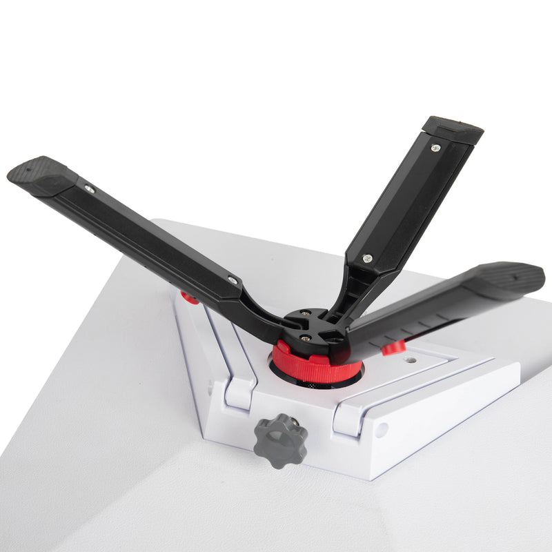 Using Included Tent Pegs to Secure Tripod in Soft Grass/Sand, Ensuring Stability in Wind.